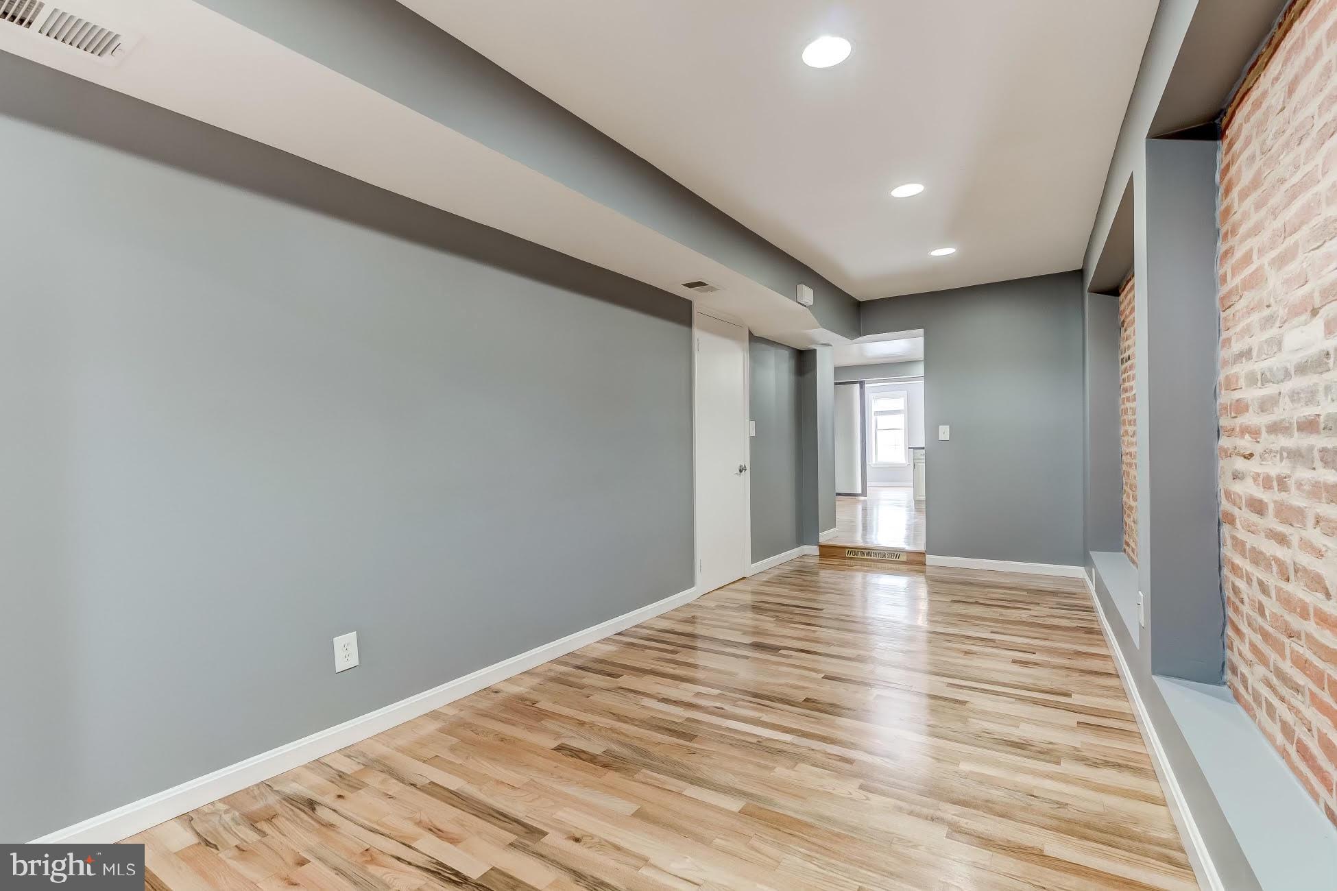 1049 South Charles Street Baltimore, MD 21230 - Photo 17 of 33 a view of an empty room and window