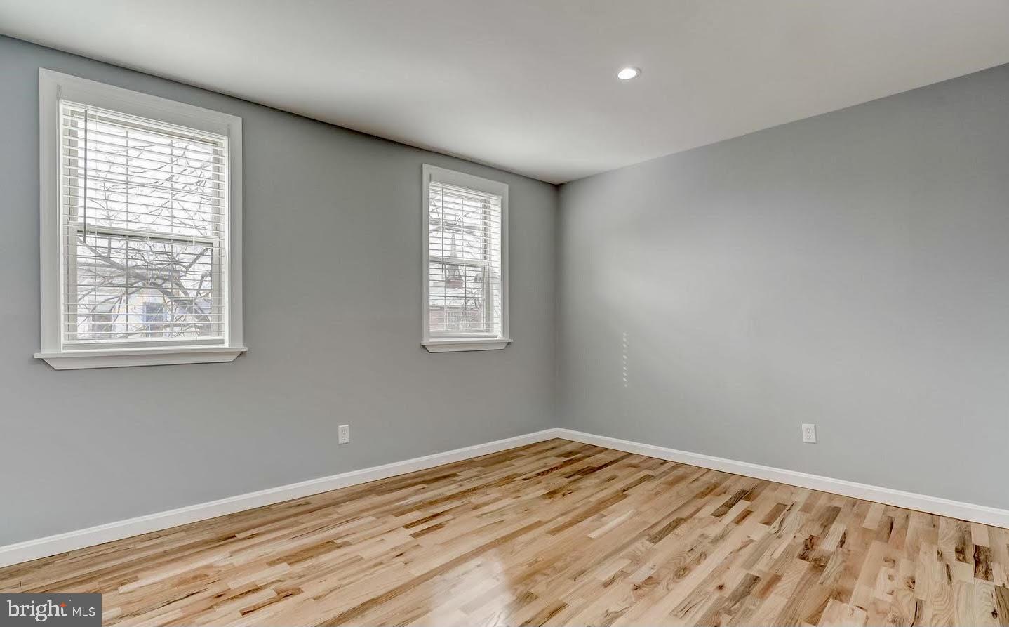 1049 South Charles Street Baltimore, MD 21230 - Photo 24 of 33 a view of empty room with wooden floor