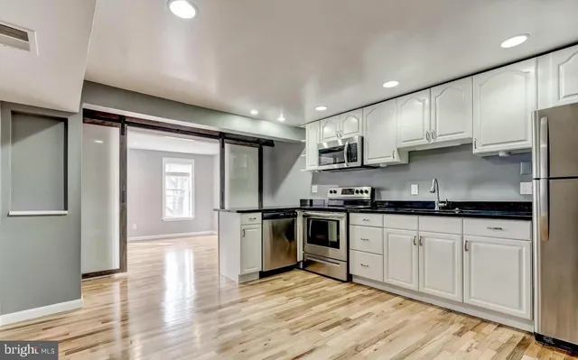a view of a bathroom from a balcony