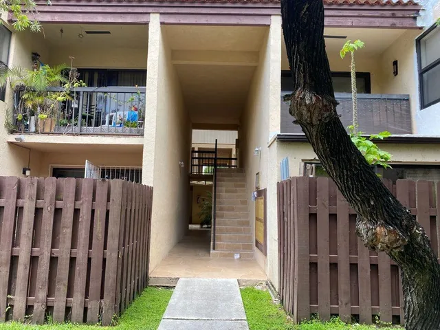 a view of a house with sitting area