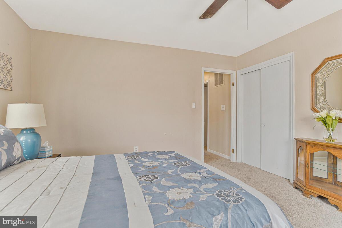 9012 Phyllis Drive Clinton, MD 20735 - Photo 19 of 33 a bedroom with a bed and a window