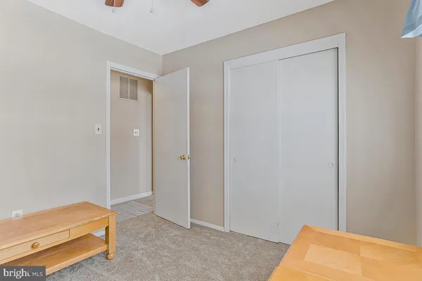 a room that has a bed and a closet