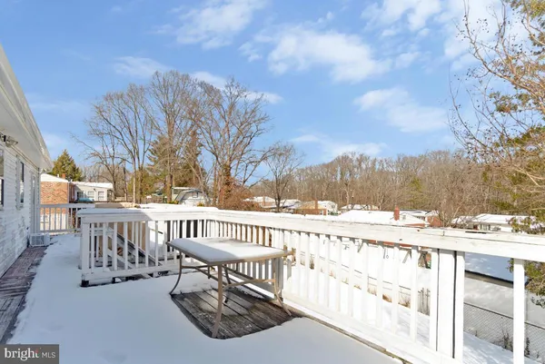 a view of a patio with a yard