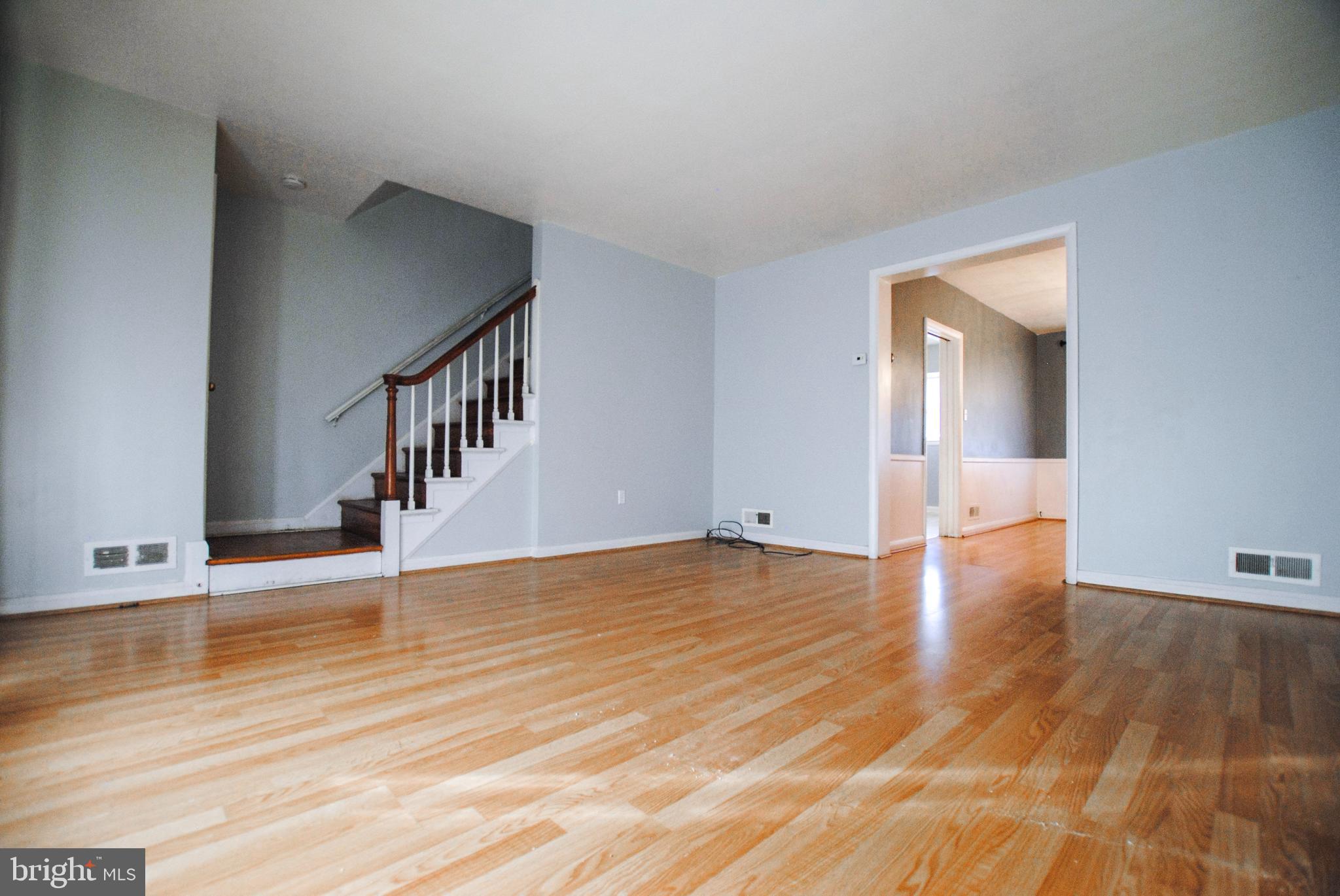 6116 Edlynne Road Baltimore, MD 21239 - Photo 18 of 52 Family Room Stairs to Upstairs