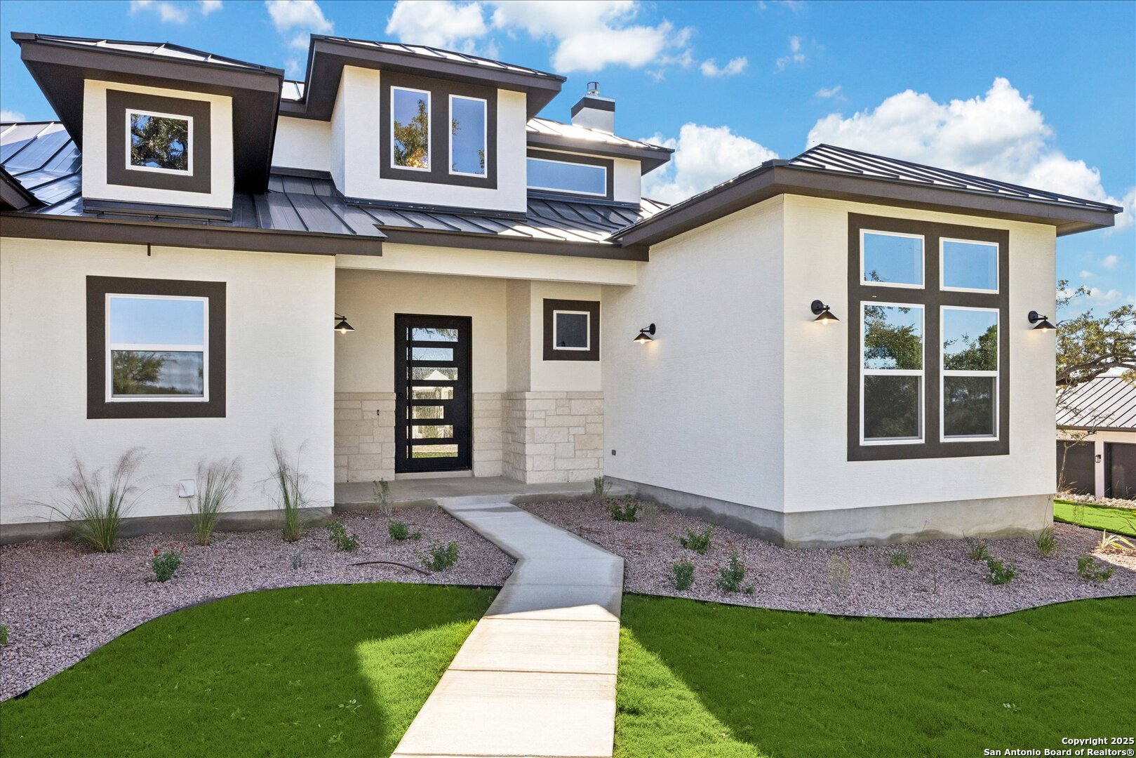 775 Maximino Ridge Bulverde, TX 78163 - Photo 2 of 41 a front view of a house with garden