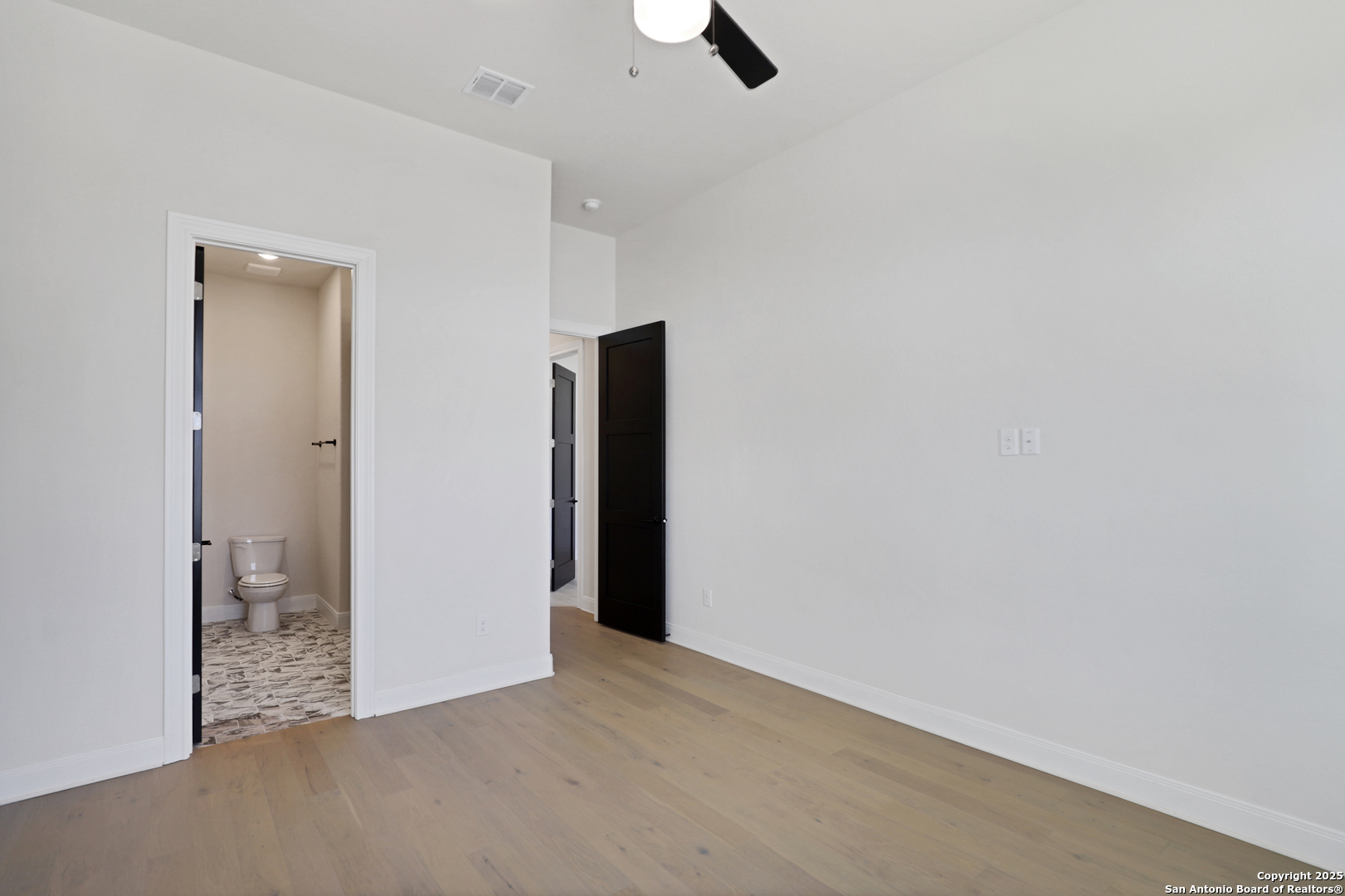 775 Maximino Ridge Bulverde, TX 78163 - Photo 28 of 41 a view of a room with a hallway
