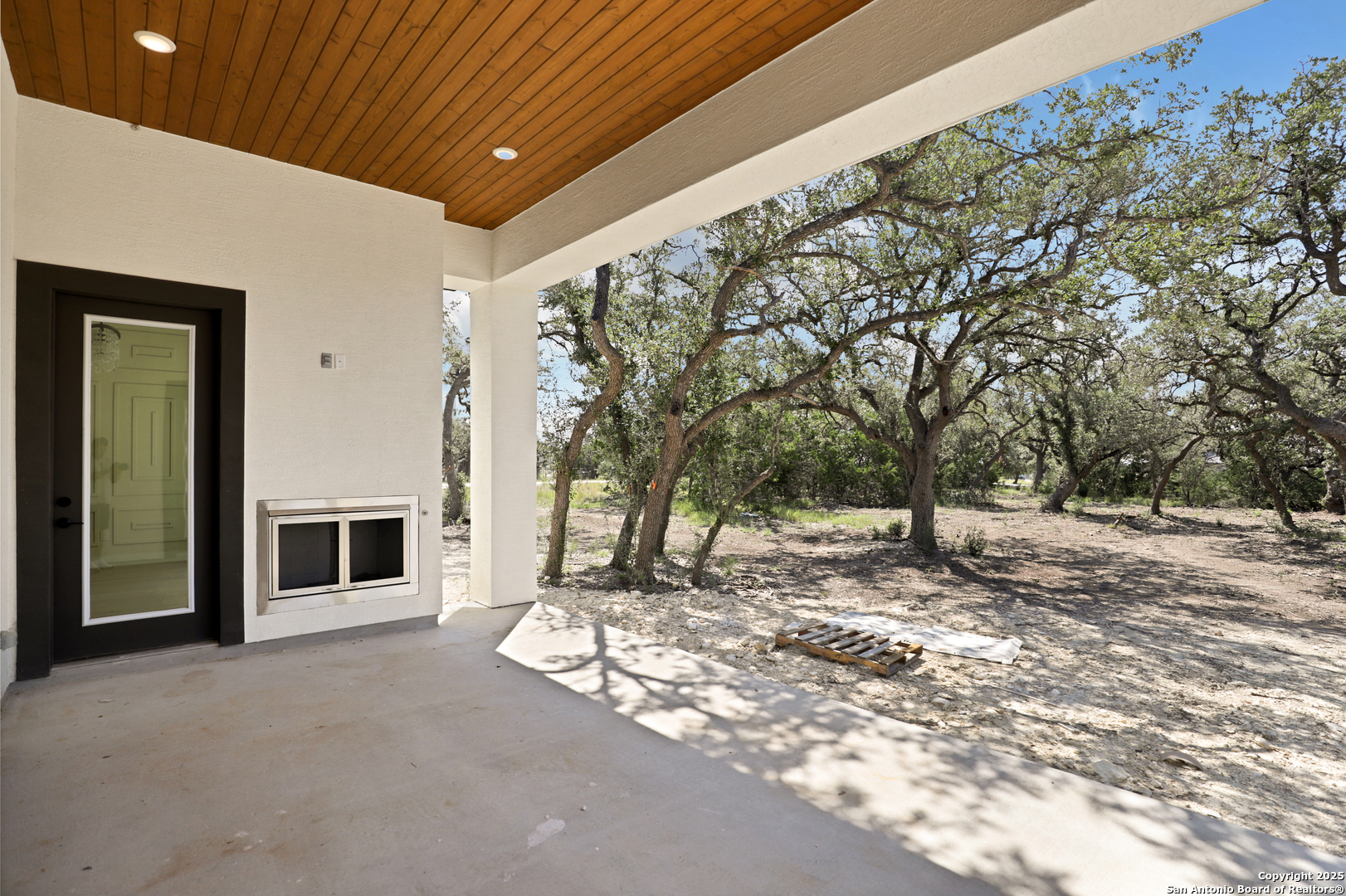 775 Maximino Ridge Bulverde, TX 78163 - Photo 38 of 41 a view of a house with a yard