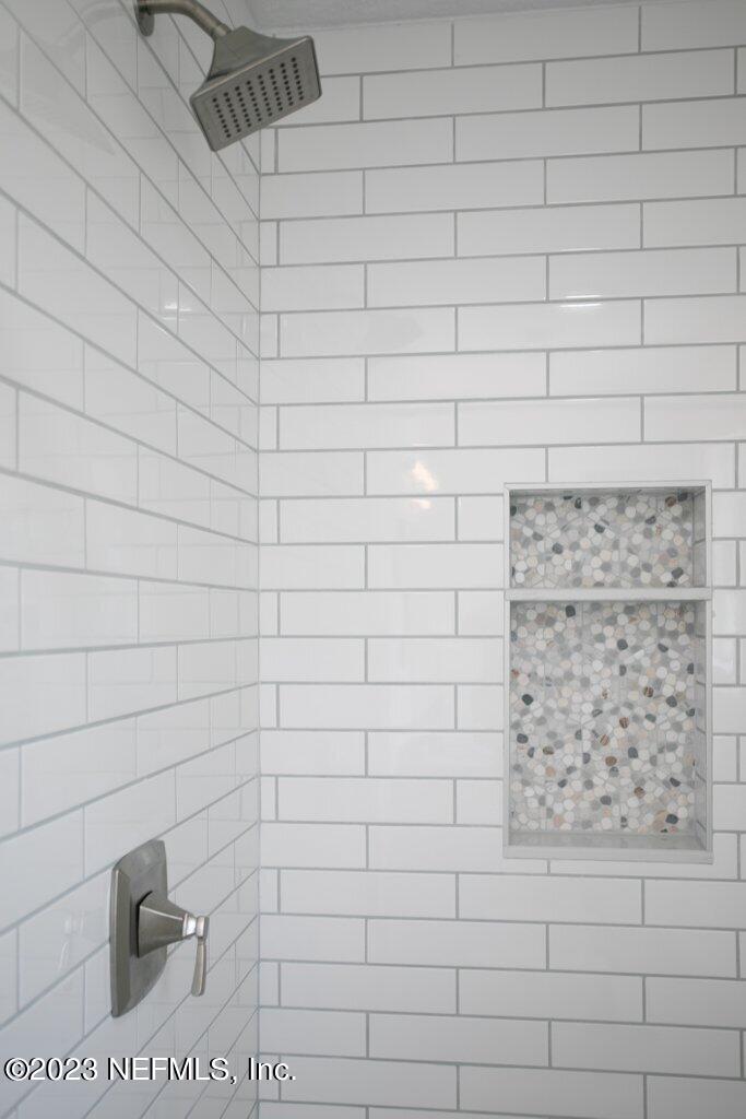 2746 Sam Road Jacksonville, FL 32216 - Photo 34 of 44 a bathroom with a shower