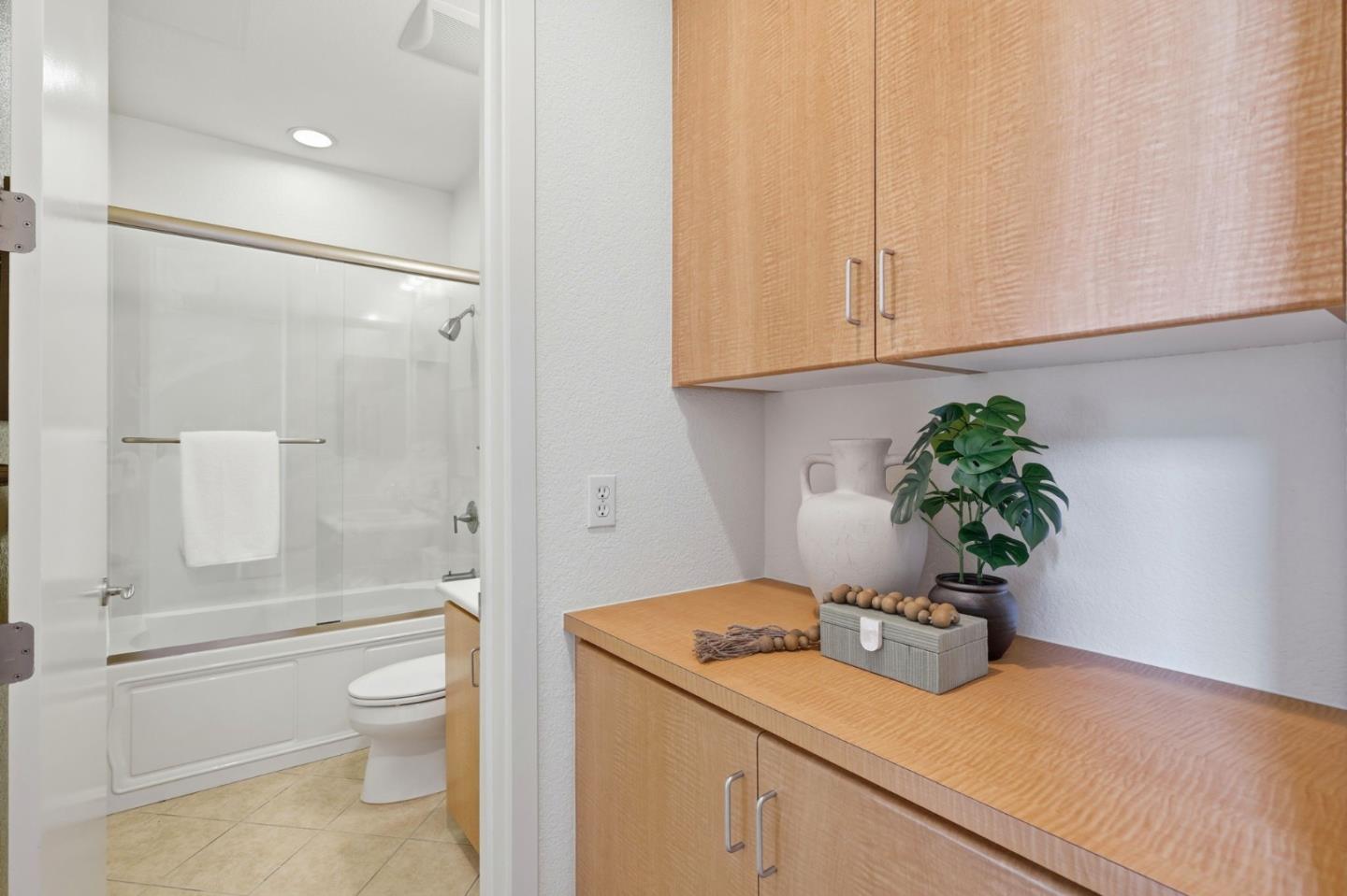 4248 Rickeys Way, Unit H Palo Alto, CA 94306 - Photo 12 of 30 a bathroom with a sink a toilet and vanity
