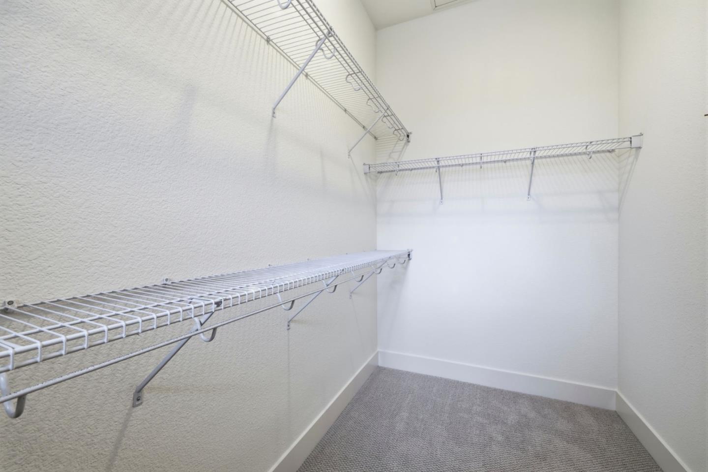 4248 Rickeys Way, Unit H Palo Alto, CA 94306 - Photo 17 of 30 a view of a room with racks on the wall