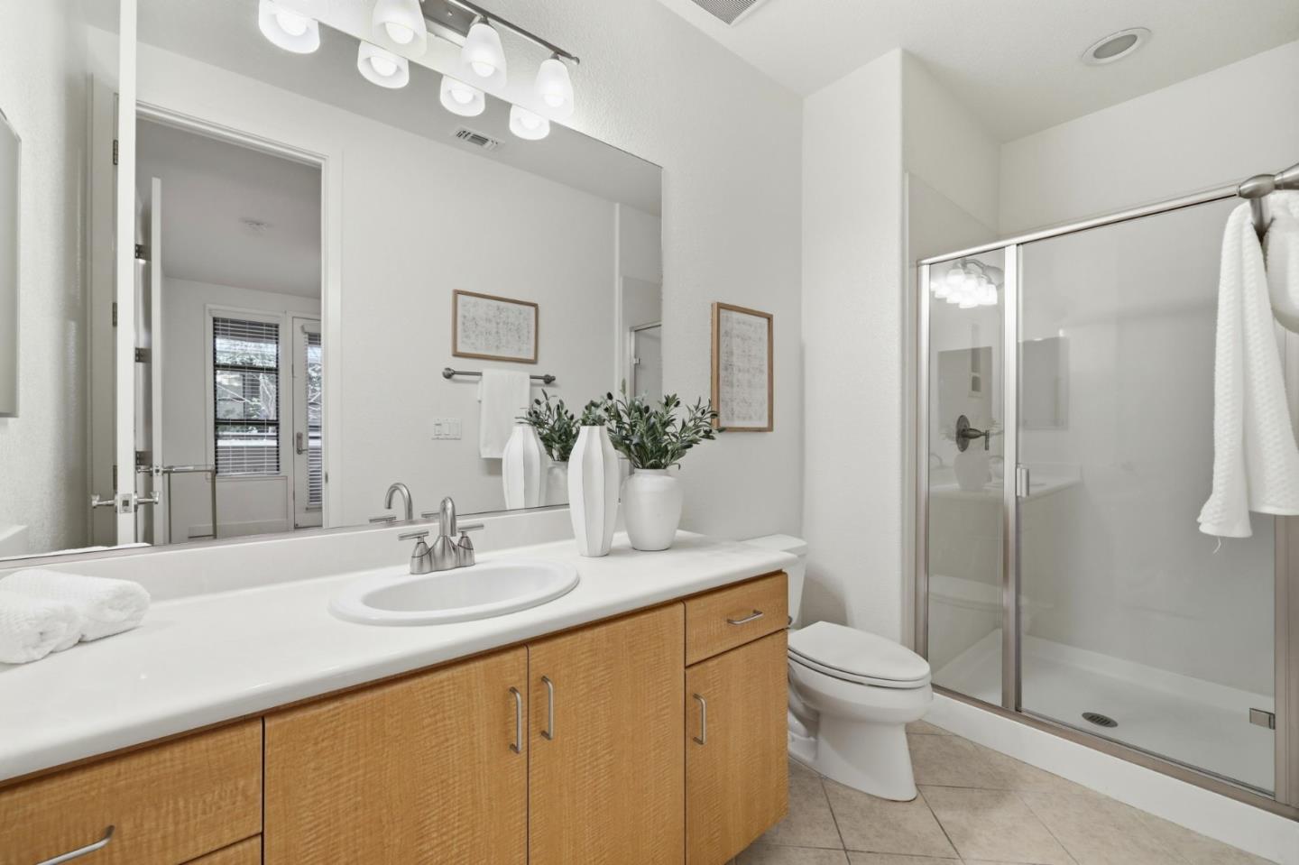 4248 Rickeys Way, Unit H Palo Alto, CA 94306 - Photo 20 of 30 a bathroom with a sink a toilet and shower