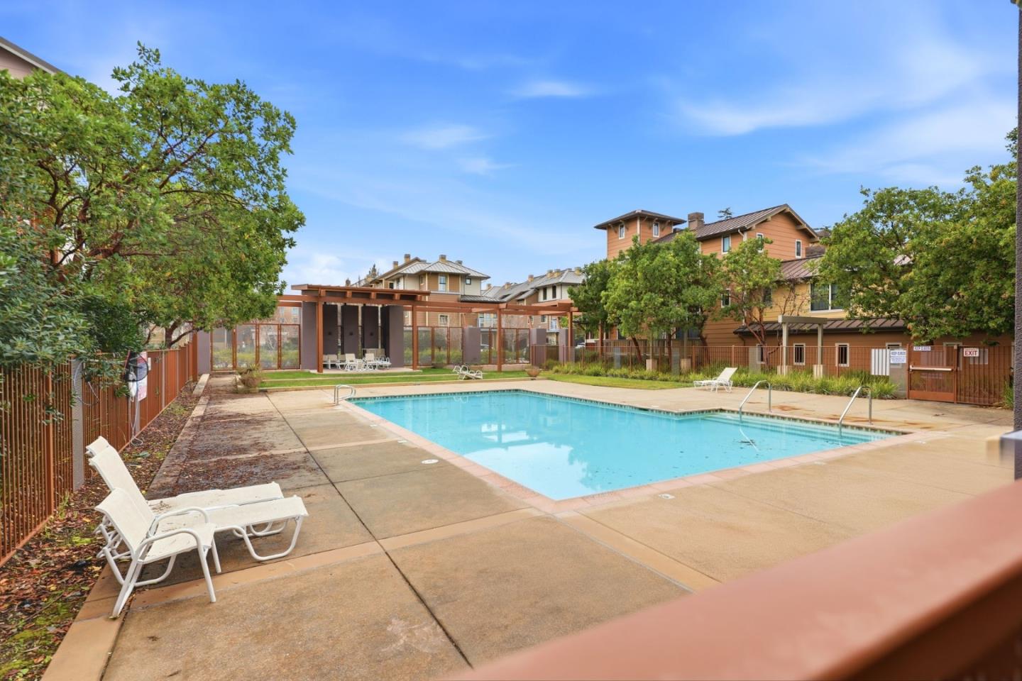 4248 Rickeys Way, Unit H Palo Alto, CA 94306 - Photo 24 of 30 a view of a swimming pool with a patio