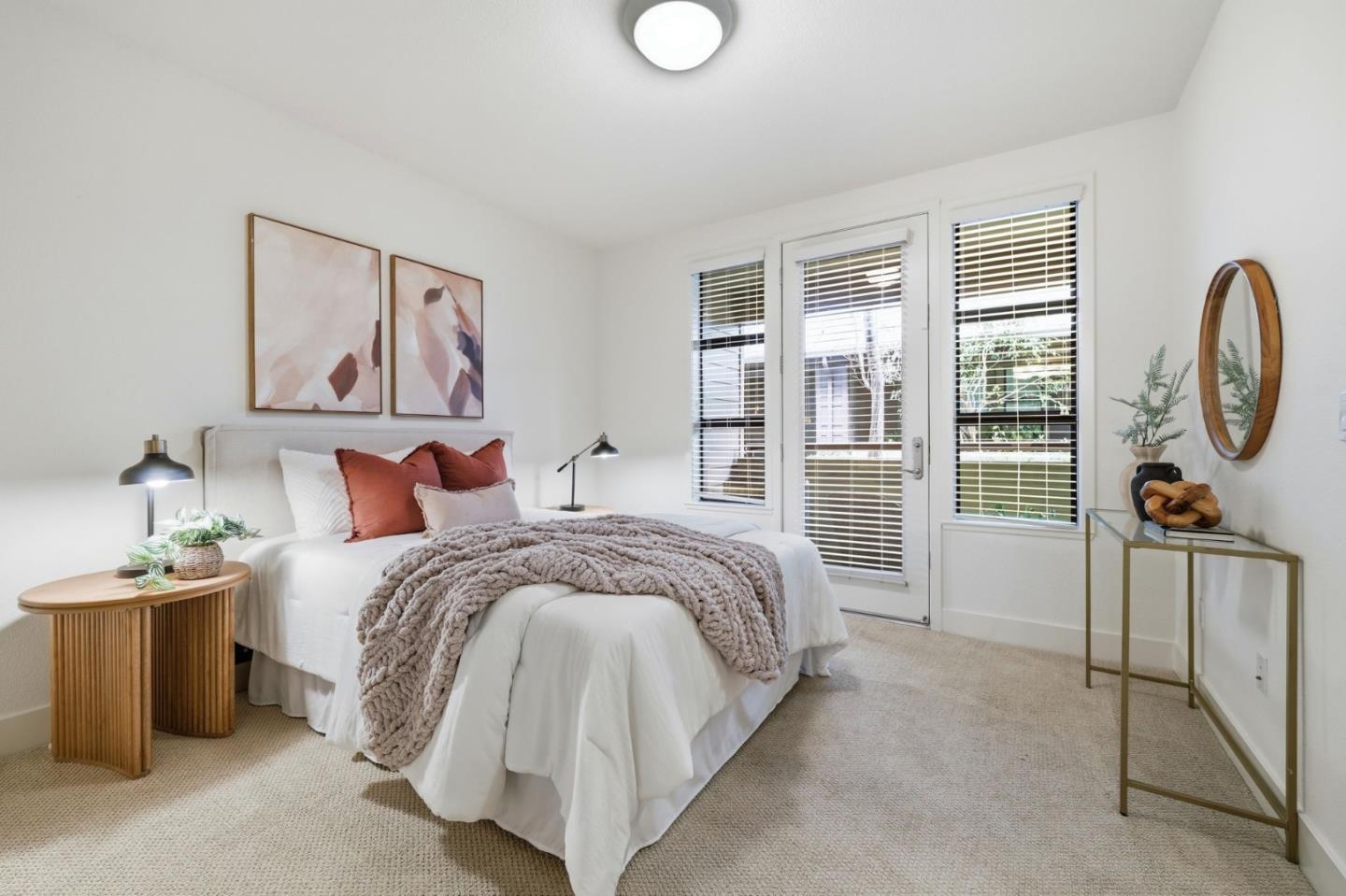 4248 Rickeys Way, Unit H Palo Alto, CA 94306 - Photo 10 of 30 a bed room with a bed and a painting on the wall