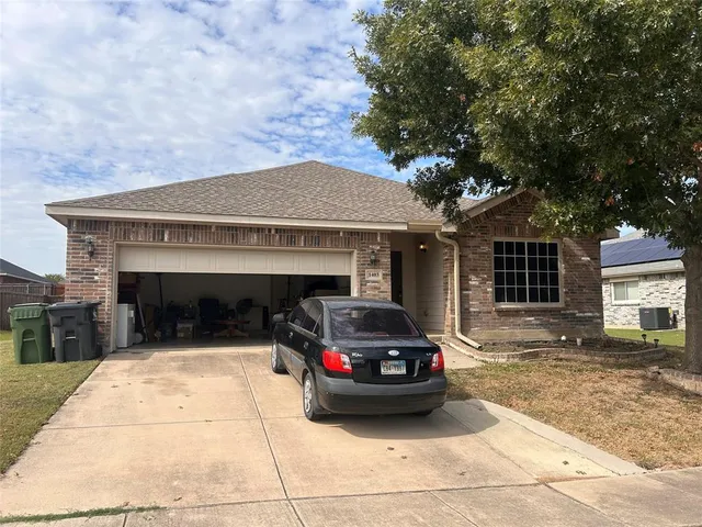 a car parked in front of a building