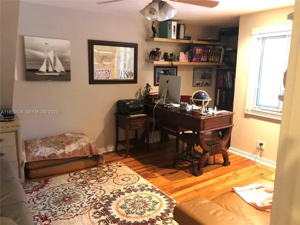 a room with furniture and a rug