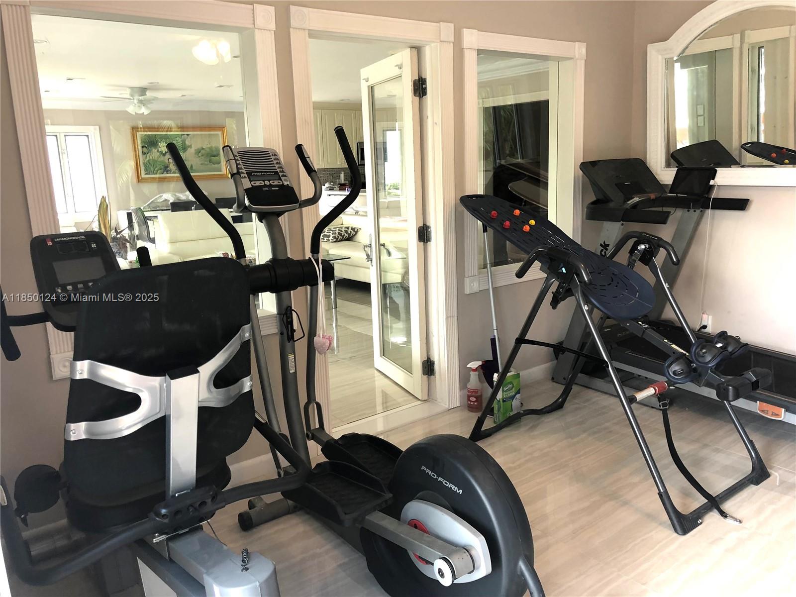 1524 Argyle Drive, Unit 1 Fort Lauderdale, FL 33312 - Photo 22 of 38 a view of a room with gym equipment