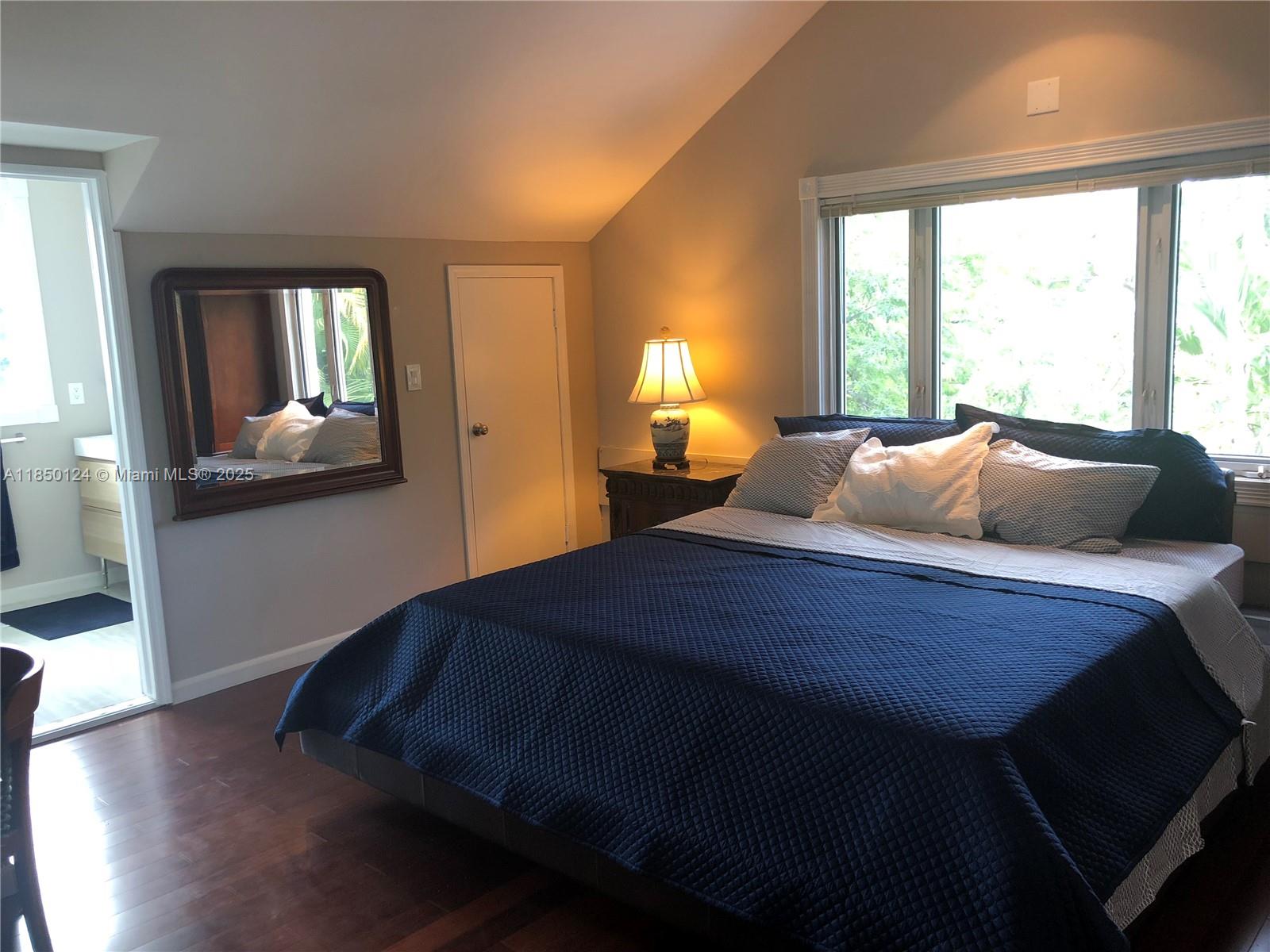 1524 Argyle Drive, Unit 1 Fort Lauderdale, FL 33312 - Photo 29 of 38 a bedroom with a bed and window