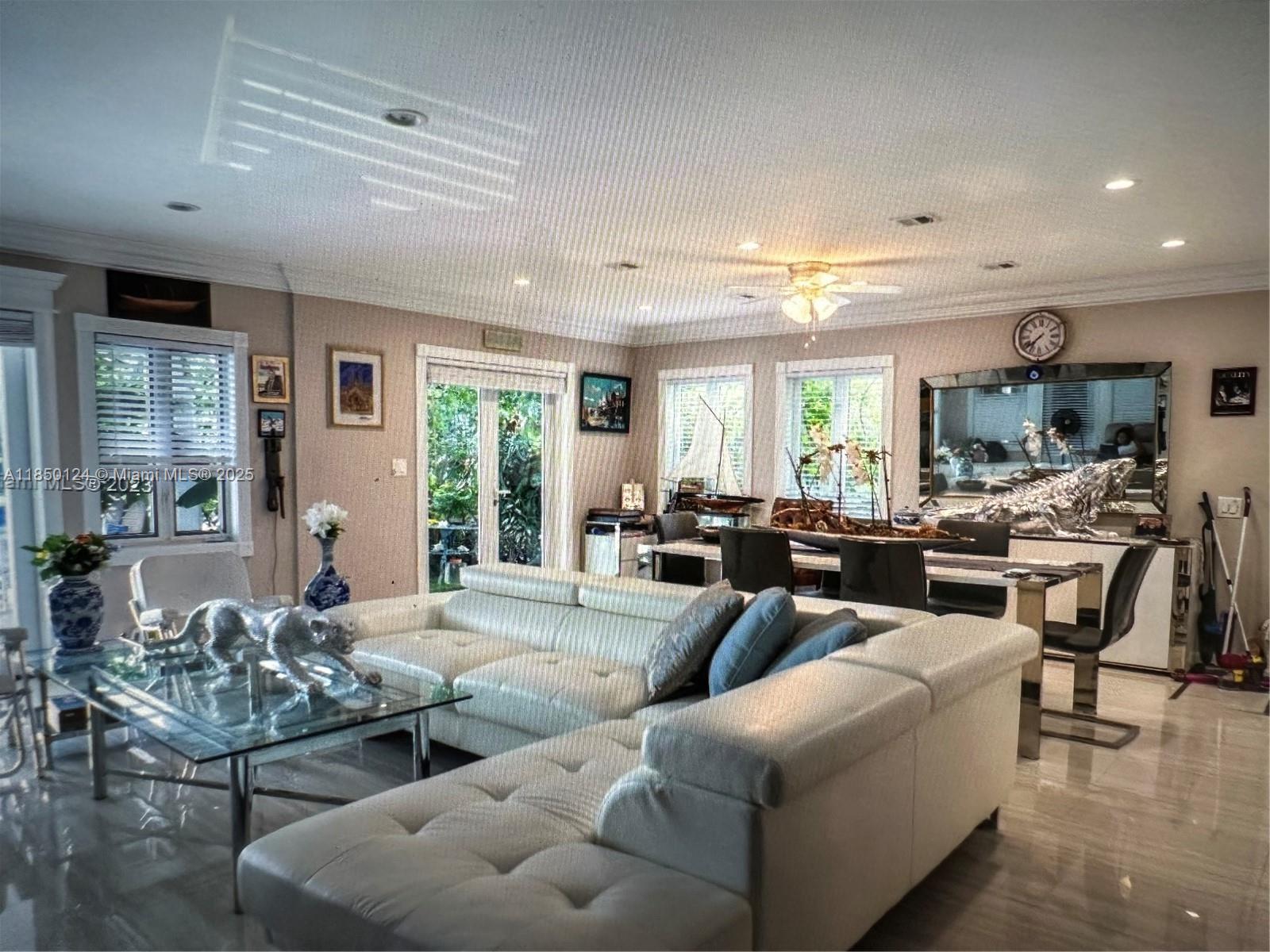 1524 Argyle Drive, Unit 1 Fort Lauderdale, FL 33312 - Photo 37 of 38 a living room with furniture and a large window