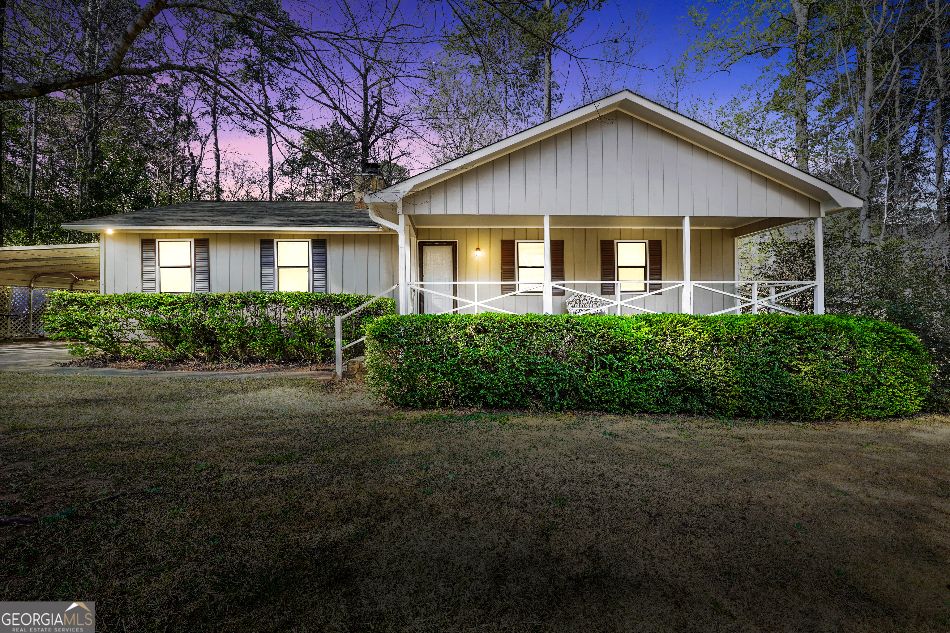 front view of a house with a yard