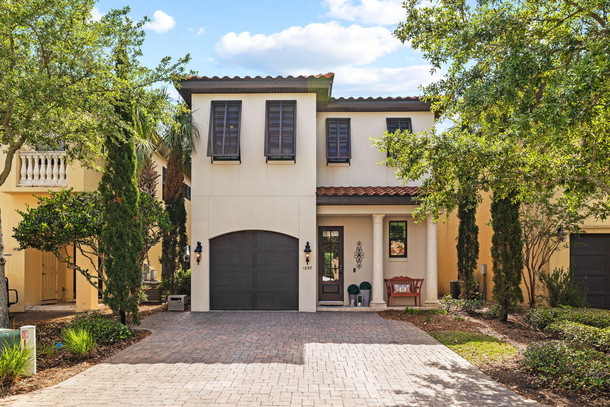 a front view of a house with yard