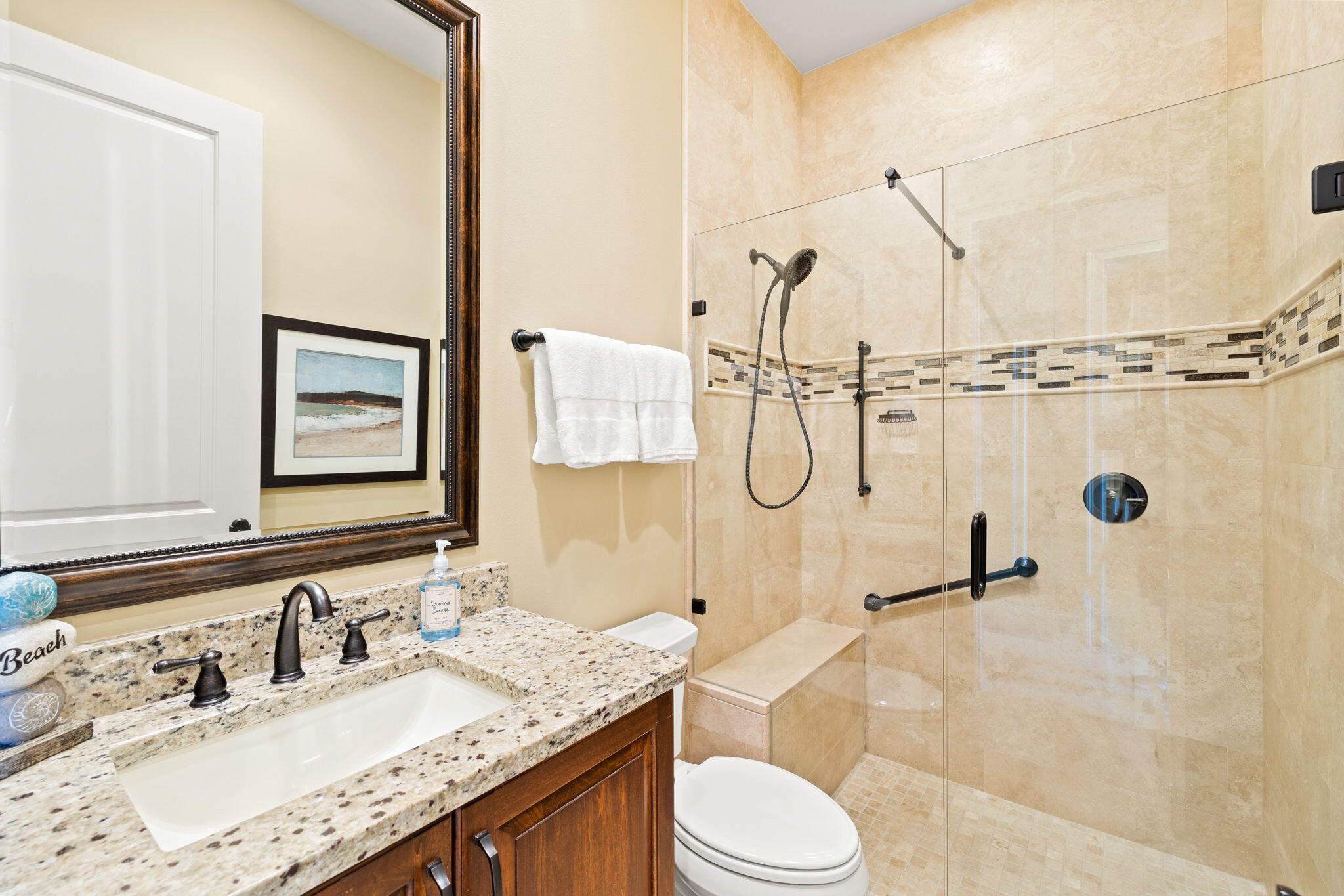 1897 Baytowne Loop Miramar Beach, FL 32550 - Photo 32 of 68 a bathroom with a granite countertop sink mirror vanity and toilet