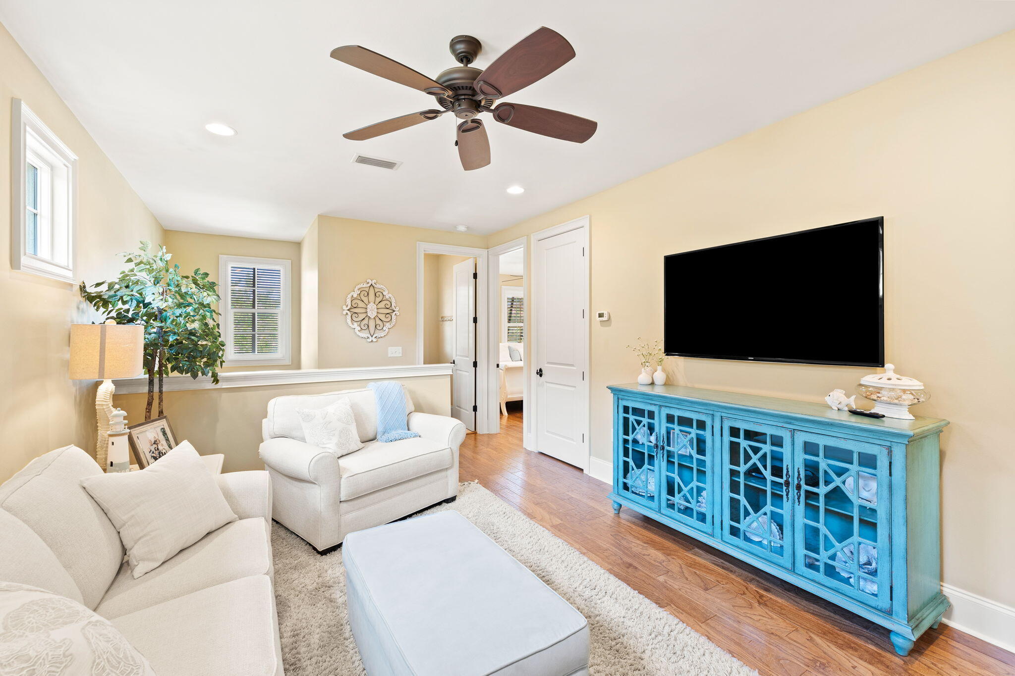 1897 Baytowne Loop Miramar Beach, FL 32550 - Photo 39 of 68 a living room with furniture and a flat screen tv