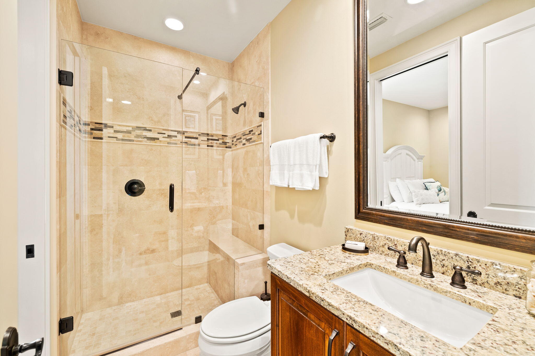 1897 Baytowne Loop Miramar Beach, FL 32550 - Photo 48 of 68 a bathroom with a granite countertop bathtub shower sink mirror and toilet