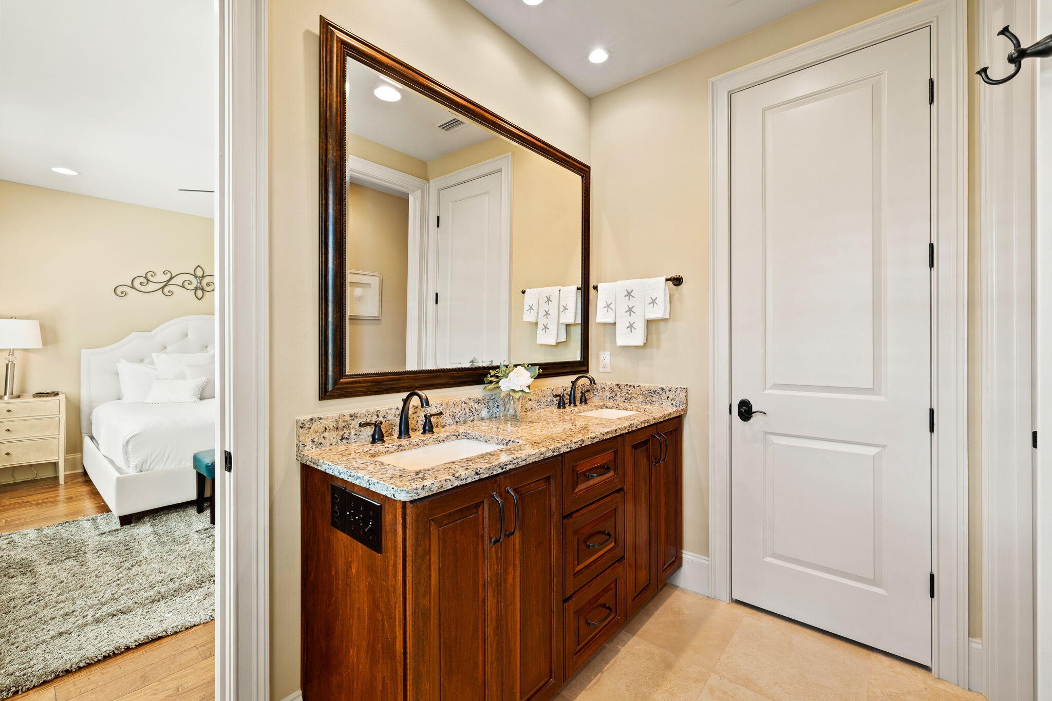 1897 Baytowne Loop Miramar Beach, FL 32550 - Photo 53 of 68 a bathroom with a granite countertop sink and a mirror
