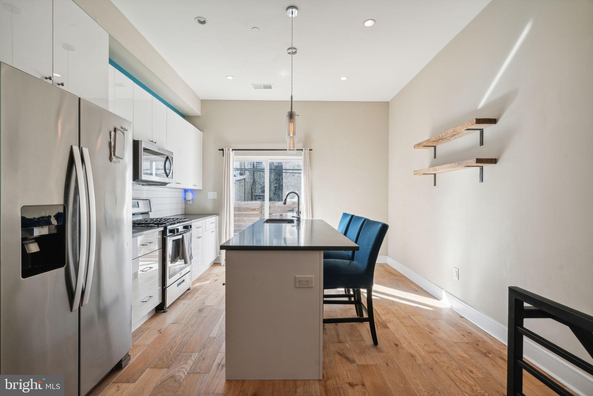 518 Mercy Street Philadelphia, PA 19148 - Photo 36 of 50 Modern kitchen with sleek finishes.