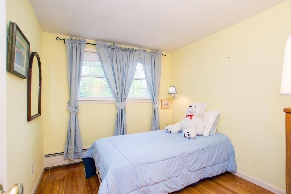 49 Ansie Road Chelmsford, MA 01824 - Photo 11 of 22 a bedroom with a bed and a window