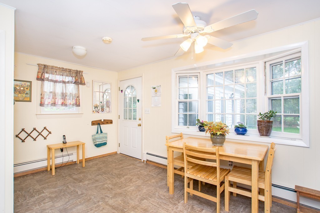 49 Ansie Road Chelmsford, MA 01824 - Photo 13 of 22 a dining room with furniture and window