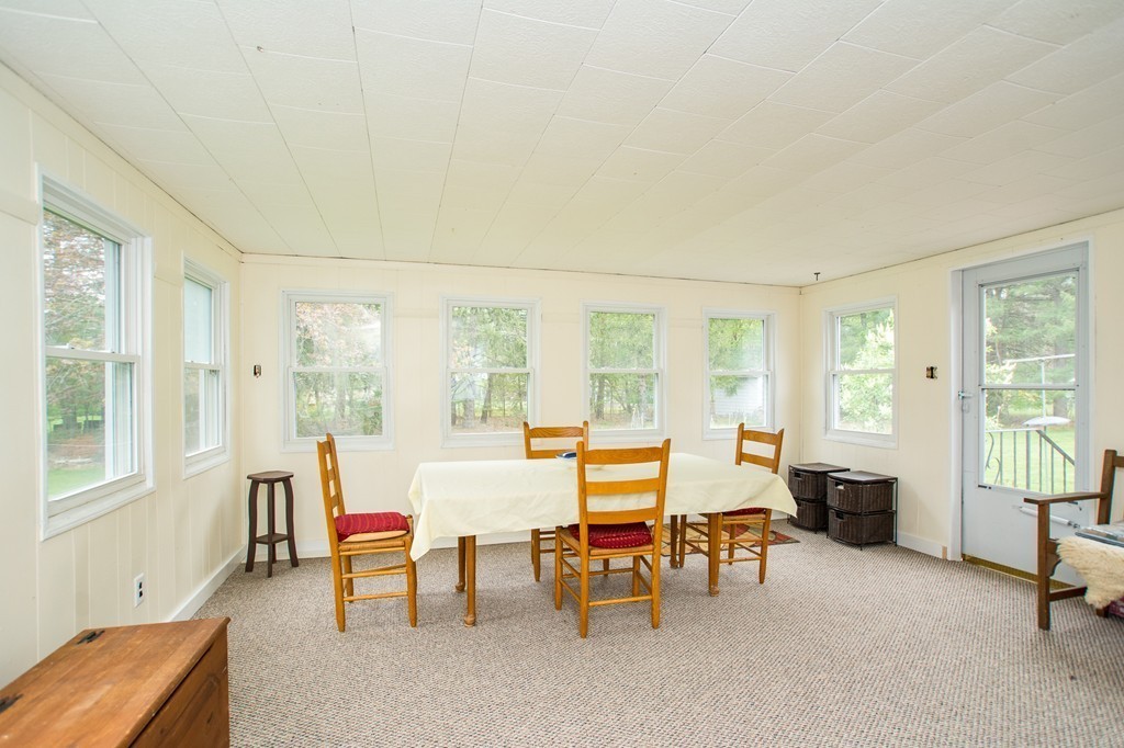 49 Ansie Road Chelmsford, MA 01824 - Photo 14 of 22 a living room with furniture and floor to ceiling windows