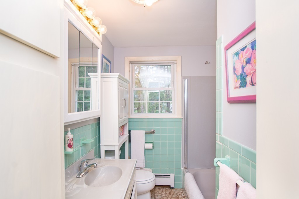 49 Ansie Road Chelmsford, MA 01824 - Photo 15 of 22 a bathroom with a sink and a mirror