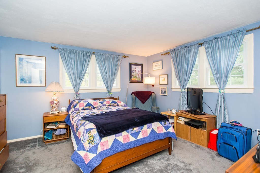 49 Ansie Road Chelmsford, MA 01824 - Photo 8 of 22 a bedroom with a bed and a window
