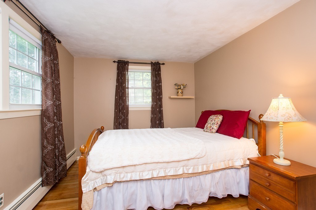 49 Ansie Road Chelmsford, MA 01824 - Photo 9 of 22 a bedroom with a bed and a window