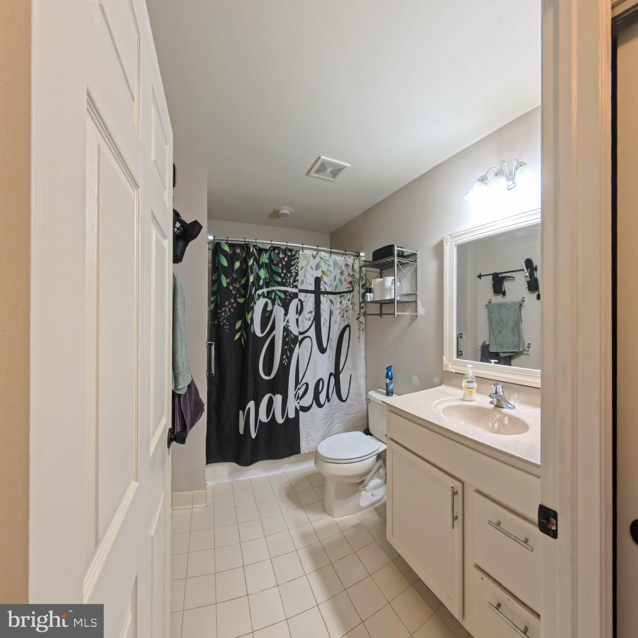 219 Flagstone Road, Unit 6 Chester Springs, PA 19425 - Photo 11 of 15 a bathroom with a double vanity sink toilet and shower