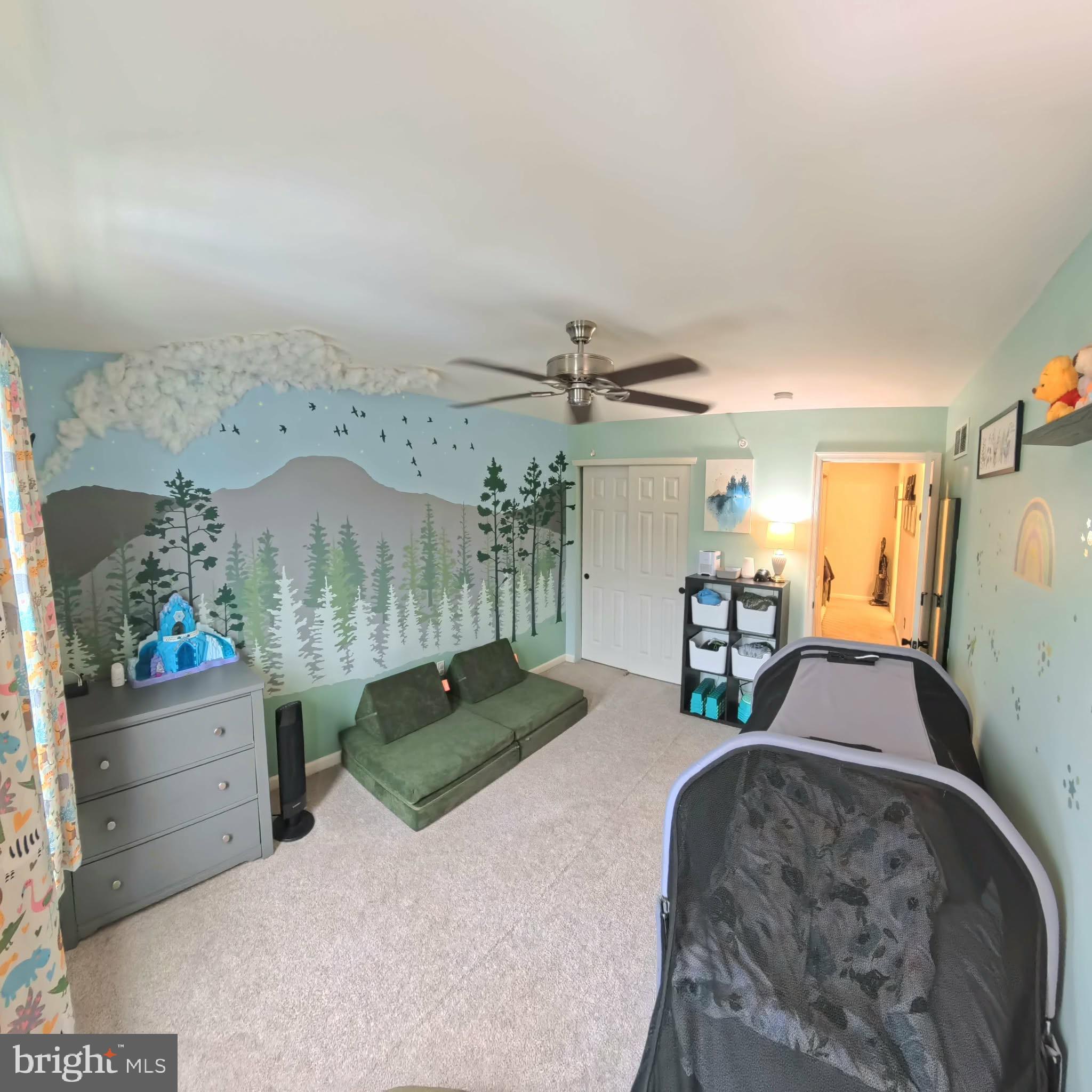 219 Flagstone Road, Unit 6 Chester Springs, PA 19425 - Photo 12 of 15 a living room with furniture and a chandelier