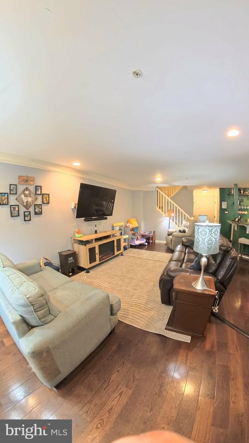 219 Flagstone Road, Unit 6 Chester Springs, PA 19425 - Photo 2 of 15 a bedroom with furniture and a large window