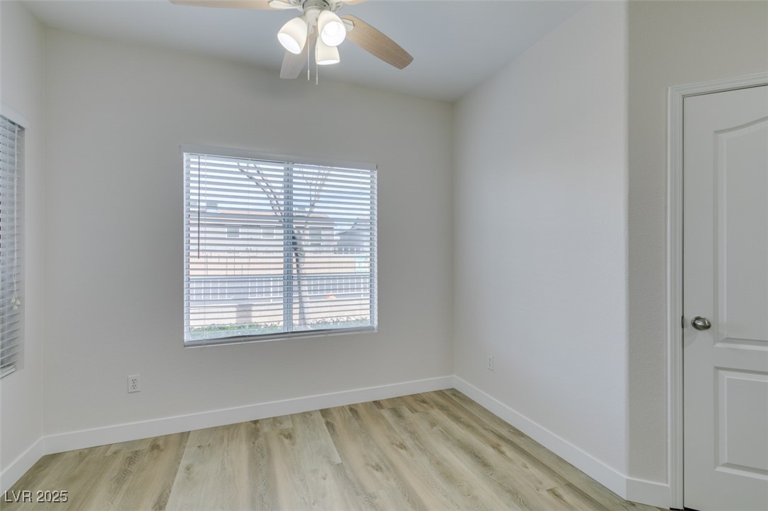 5525 West Flamingo Road, Unit 1028 Las Vegas, NV 89103 - Photo 19 of 42 Spare room with light wood finished floors and a ceiling fan