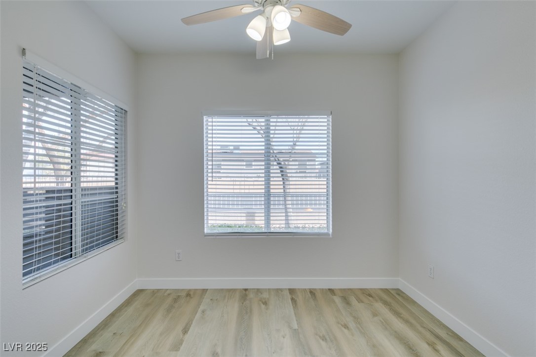 5525 West Flamingo Road, Unit 1028 Las Vegas, NV 89103 - Photo 20 of 42 Spare room featuring light wood-style floors and ceiling fan