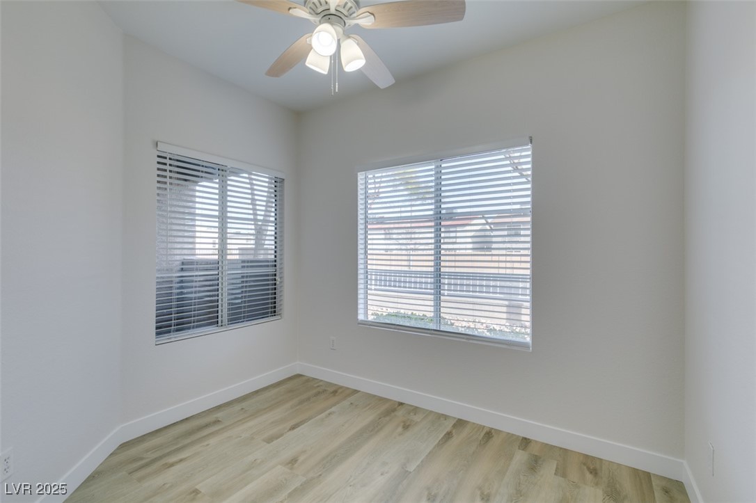 5525 West Flamingo Road, Unit 1028 Las Vegas, NV 89103 - Photo 21 of 42 Spare room featuring light wood-type flooring and ceiling fan