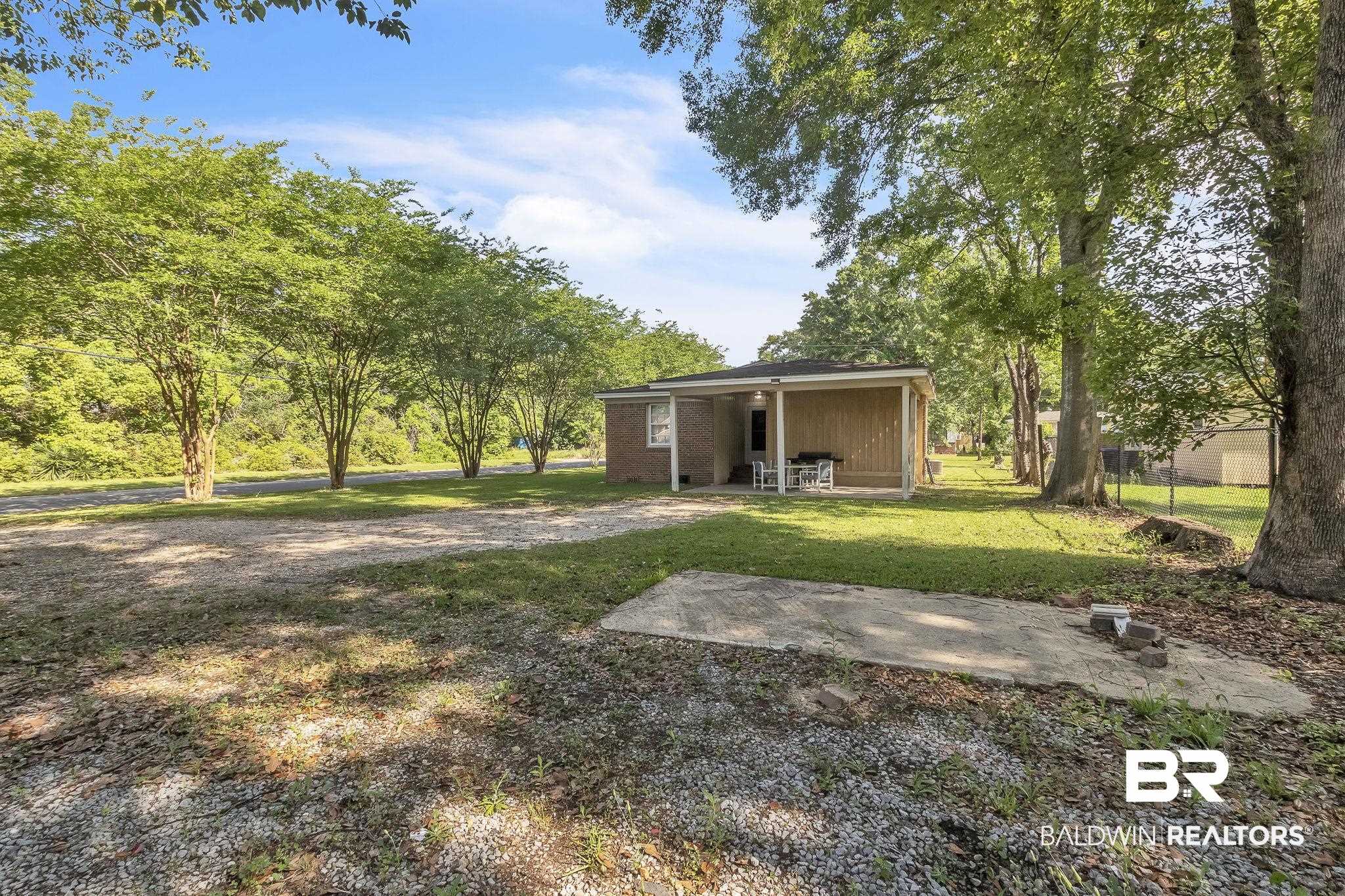 315 Fourth Avenue Chickasaw, AL 36611 - Photo 10 of 28 View of yard featuring a patio
