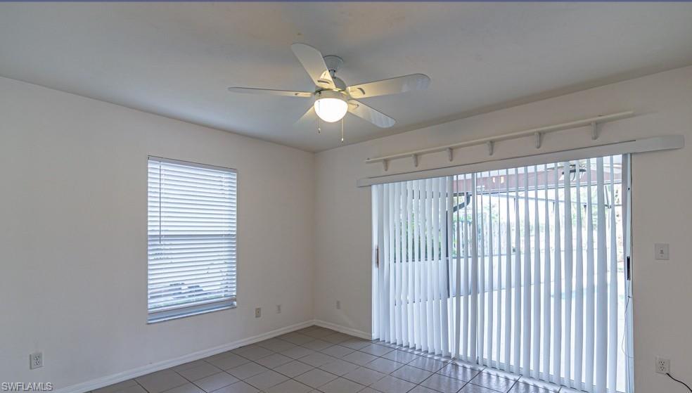 1620 Forest Lakes Boulevard Naples, FL 34105 - Photo 11 of 27 a view of an empty room with a window