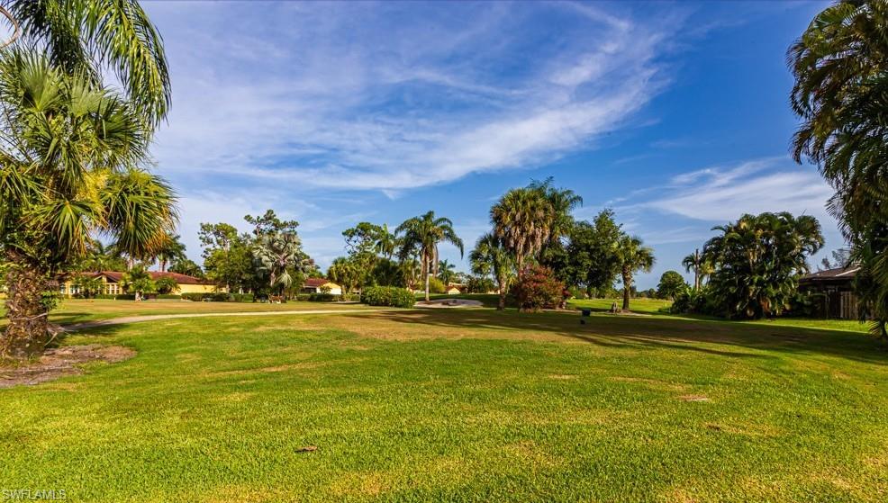 1620 Forest Lakes Boulevard Naples, FL 34105 - Photo 27 of 27 a view of a yard in front of the house