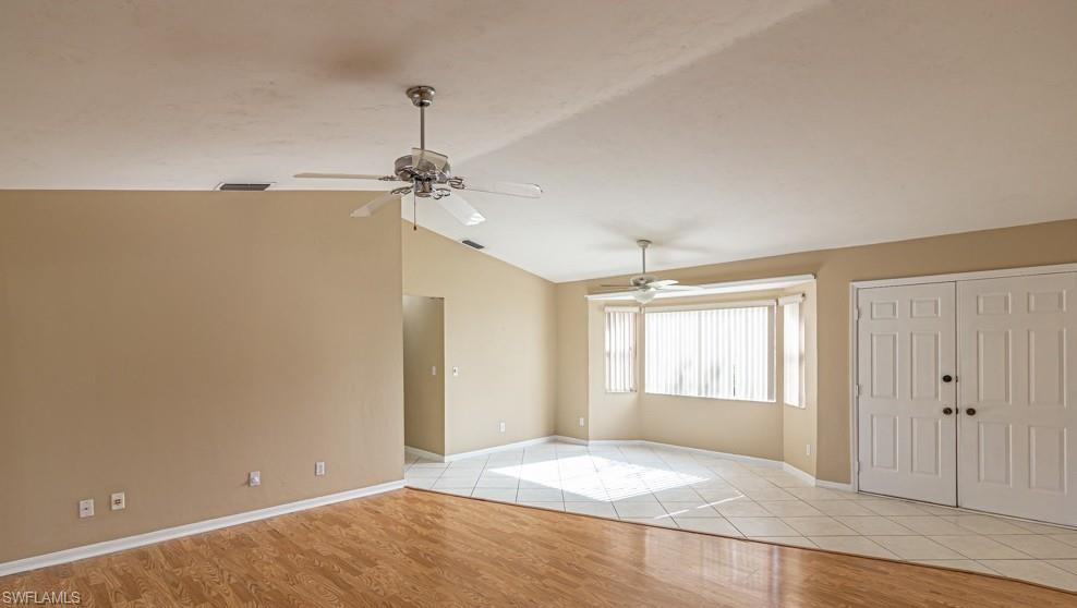 1620 Forest Lakes Boulevard Naples, FL 34105 - Photo 6 of 27 a view of an empty room with a window