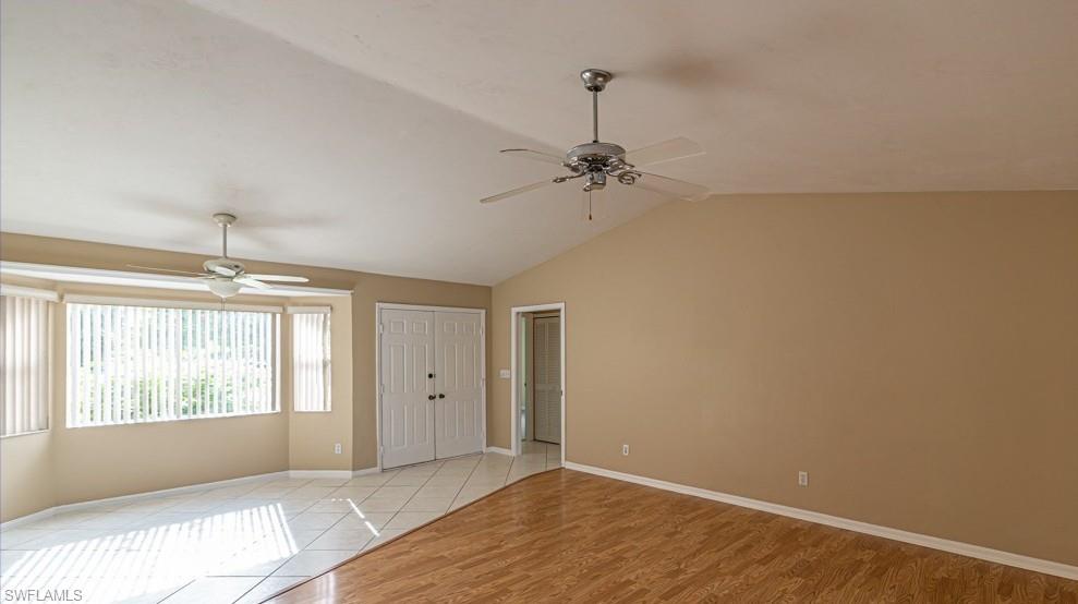 1620 Forest Lakes Boulevard Naples, FL 34105 - Photo 7 of 27 a view of an empty room with a window