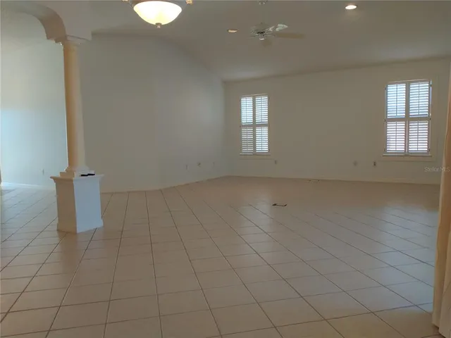 a view of an empty room and window