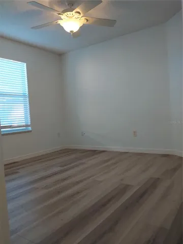 a bathroom with a toilet and shower