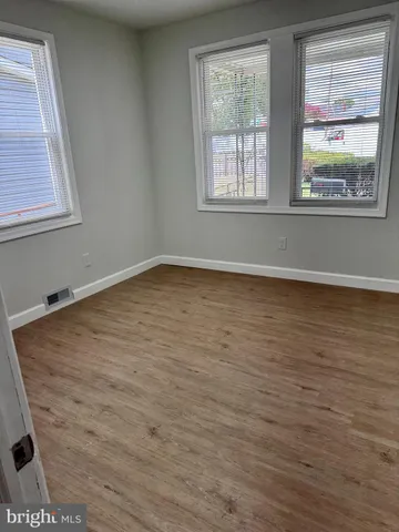 a view of a garden with houses