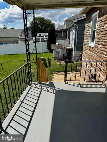 a aerial view of a house with a garden